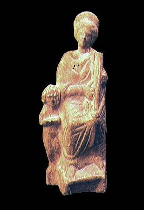 Figurina in terra cotta, che rappresenta una divinit femminile che suona uno strumento musicale