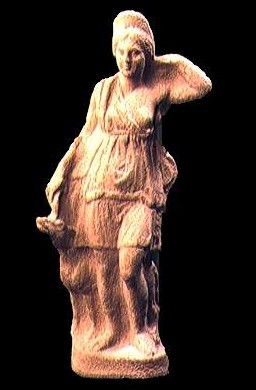 Statuetta della dea Diana vestita da Amazzone, in compagnia di un cane dal muso alzato. (Museo del Bardo)