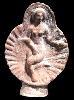 Statuetta in terra cotta che raffigura Venere protettrice dei morti. E' raffigurata in una conchiglia con in mano una mela, uno dei suoi attributi. Proviene da Hadrumetum (ora al Museo del Bardo)