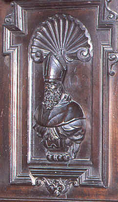 Agostino vescovo, intaglio del Coro della chiesa agostiniana di san Marco a Milano