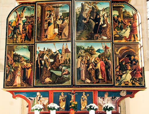La pala d'altare con l'immagine di Agostino nella predella a sinistra
