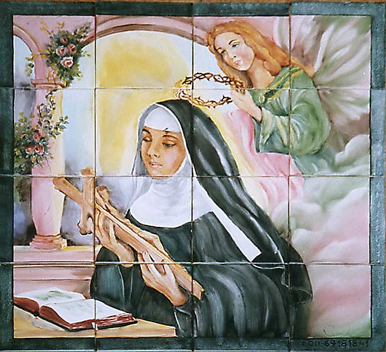 Santa Rita da Cascia adora il crocefisso