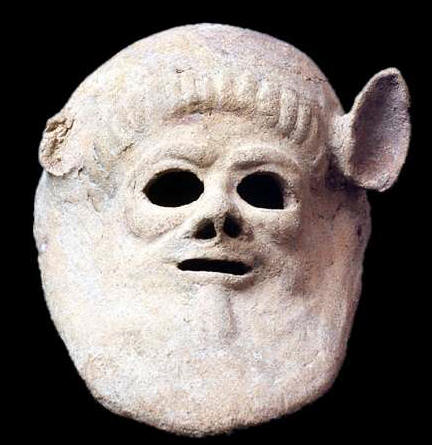 Maschera in terra cotta che raffigura una faccia di satiro