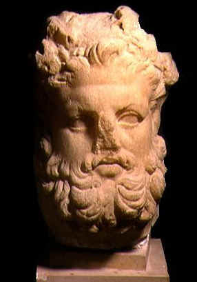 Testa di Ercole coronata eseguita in pietra. Datazione incerta. Attualmente  al Museo del Bardo