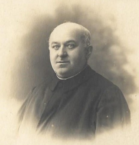 Immagine del parroco don Carlo Biffi
