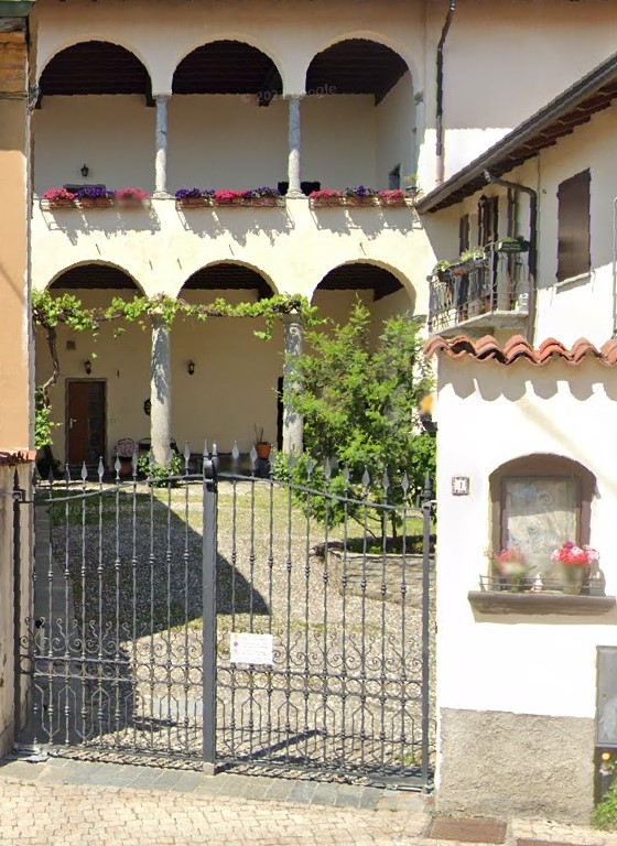 La casa Masnaga con l'immagine della Beata Vergine