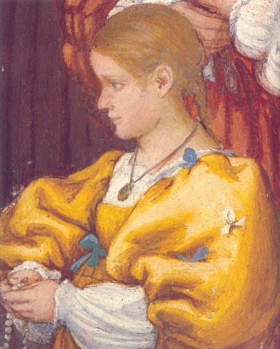 Una figlia di Battista Suardi inginocchiata in preghiera con il rosario in mano