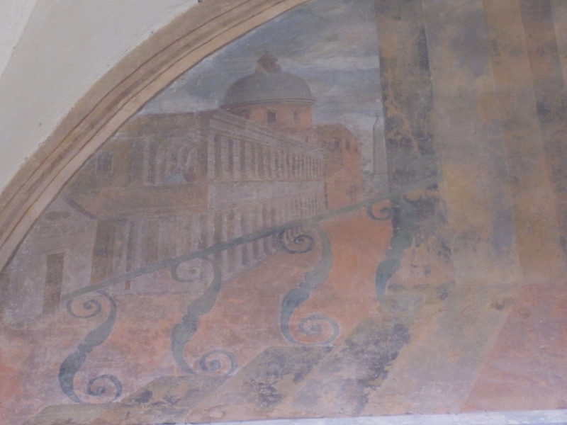 Agostino scrive nel suo studio, lunetta nel chiostro del convento agostiniano di Cortona