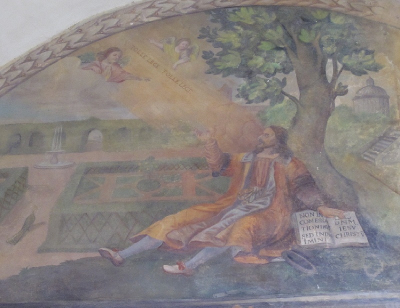 La scena del tolle lege a Milano nel chiostro del convento agostiniano di Cortona