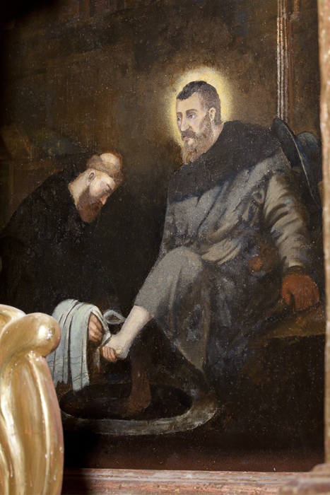 Agostino lava i piedi al Cristo pellegrino