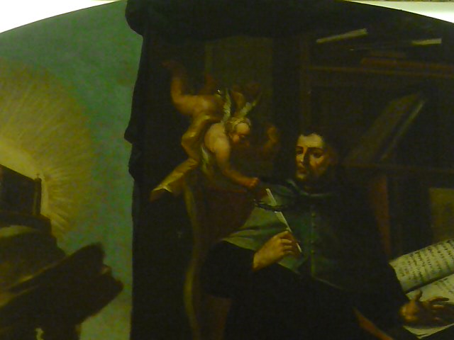 Agostino scrive le sue opere: particolare dell'angelo