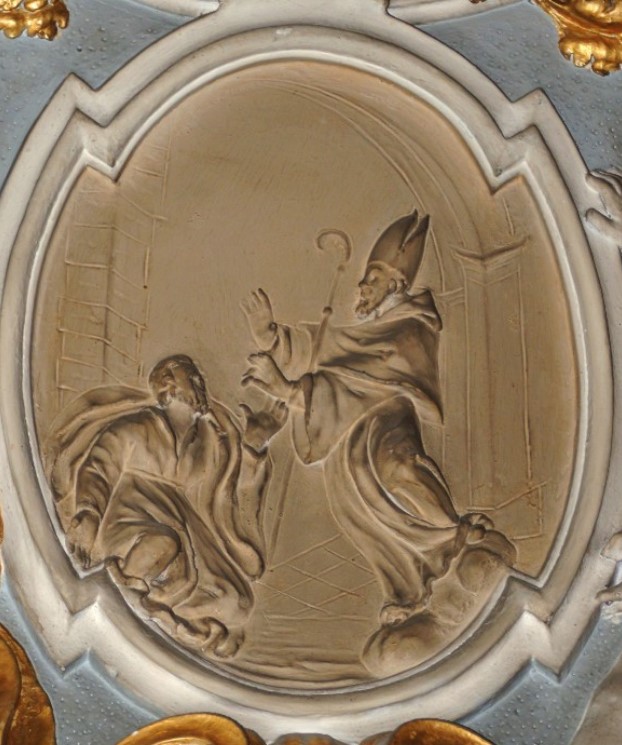 Agostino benedice un fedele
