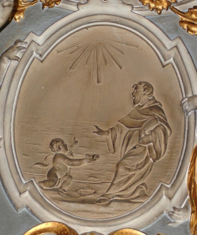 Agostino e il bambino in riva al mare