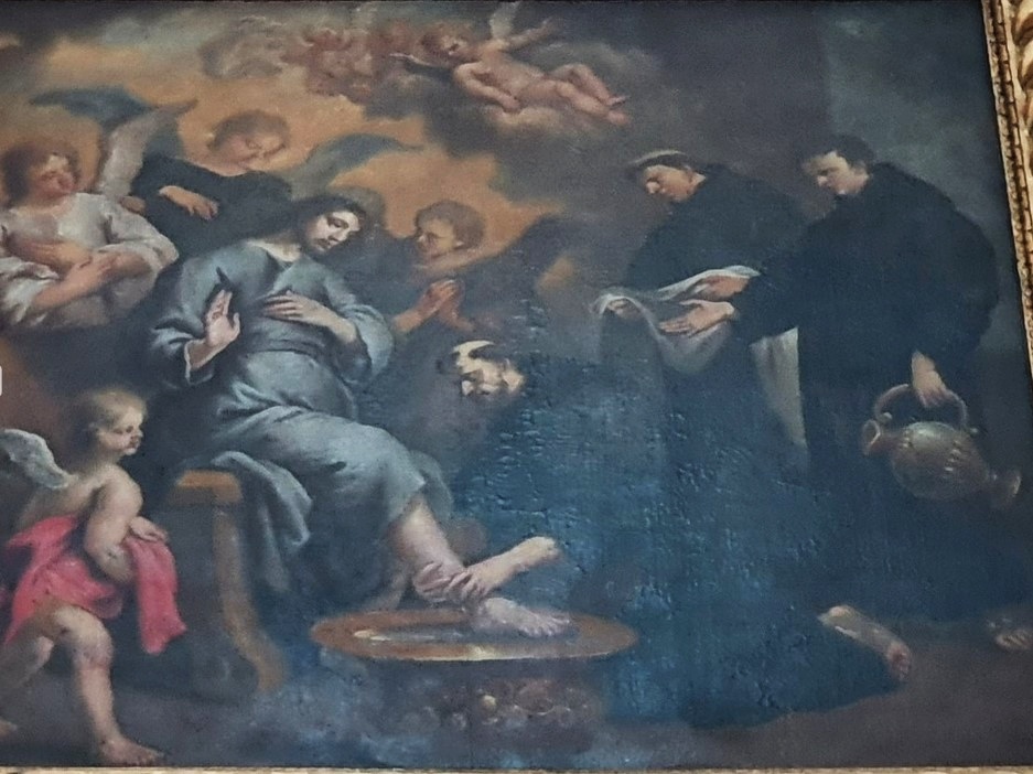 Agostino lava i piedi al Cristo pellegrino