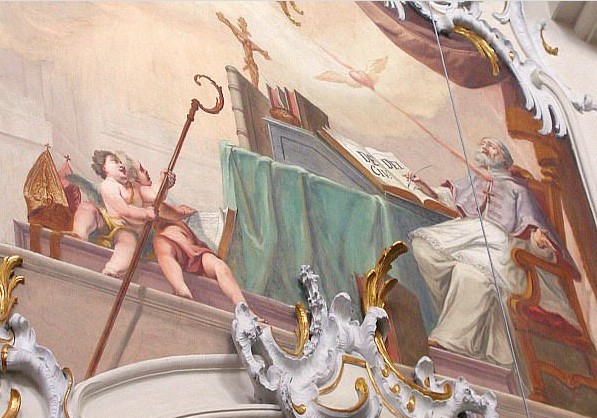 Agostino colpito dall'amore scrive la città di Dio