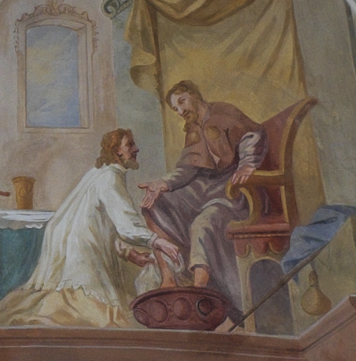 Agostino lava i piedi al Cristo pellegrino