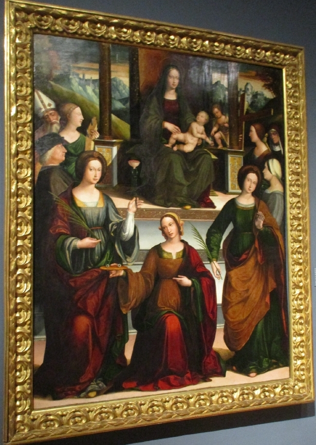 Madonna in trono col Bambino, S. Giovannino, le Sante Lucia, Agata, Caterina, Apollonia, Elena e Monica con Sant'Agostino e il committente