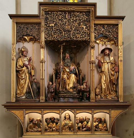 Sculture di Nickolaus Hagenauer: Agostino (sinistra), Antonio (al centro) e Gerolamo (sinistra). Le sculture nella predella di Desiderius Beichel raffigurano scena della vita di Gesù