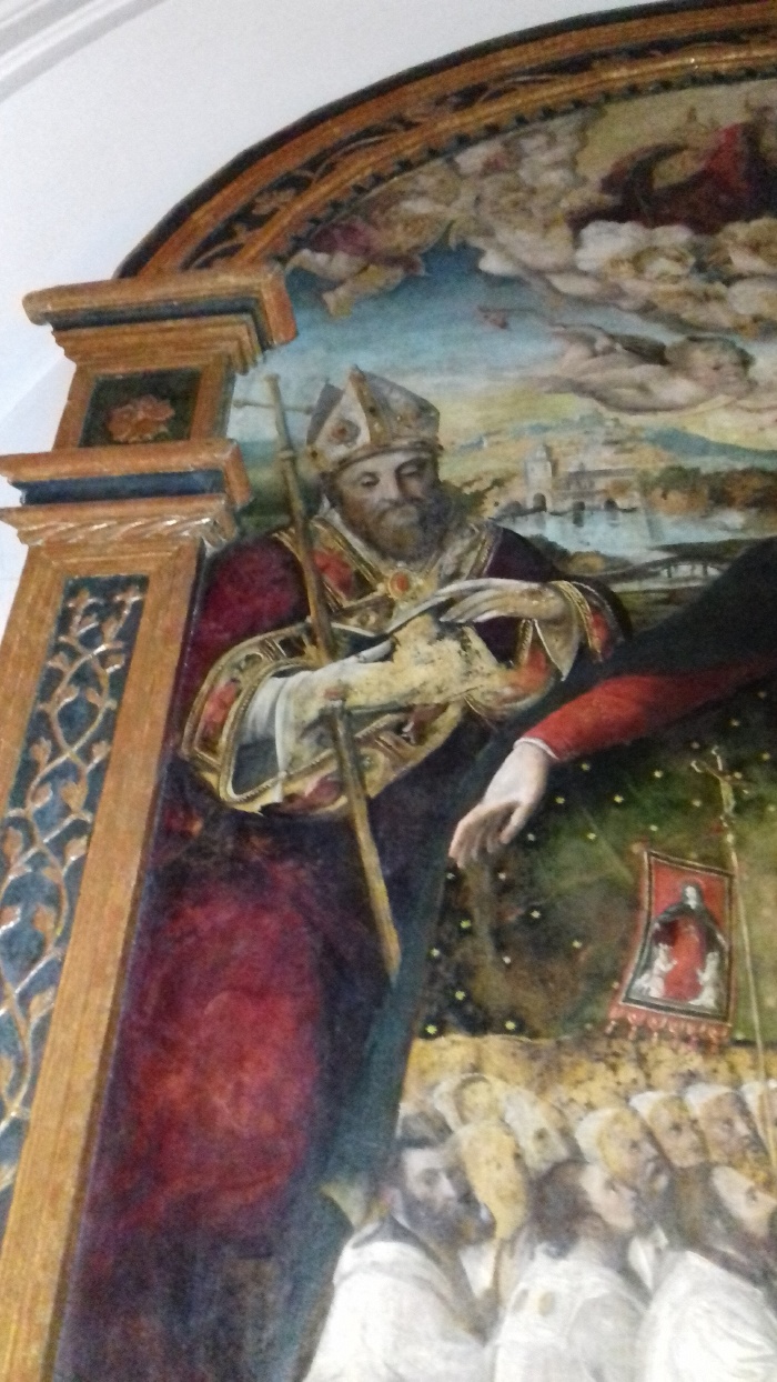 Particolare di sant'Agostino con ai piedi i fedeli della confraternita: foto Gianluca Alzati