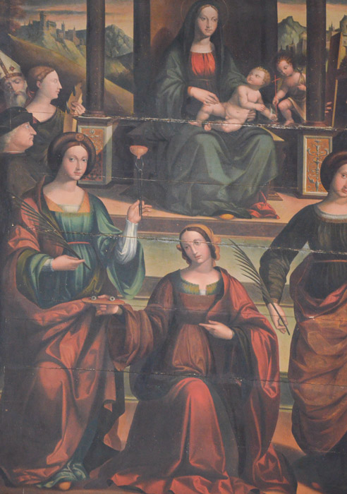 Madonna in trono col Bambino, S. Giovannino, le Sante Lucia, Agata, Caterina, Apollonia, Elena e Monica con Sant'Agostino e il committente