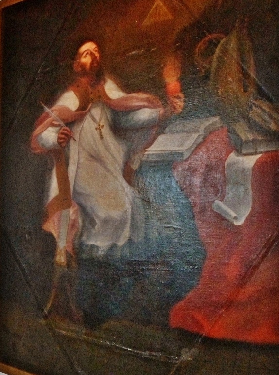 Agostino vescovo e cardioforo scrive ispirato dalla Trinità