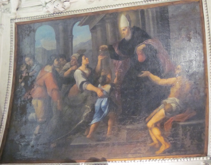 Agostino fa l'elemosina ai poveri