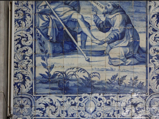 Agostino lava i piedi al Cristo pellegrino