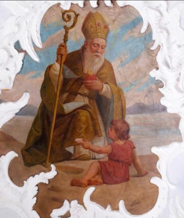 Agostino e il bambino sulla spiaggia